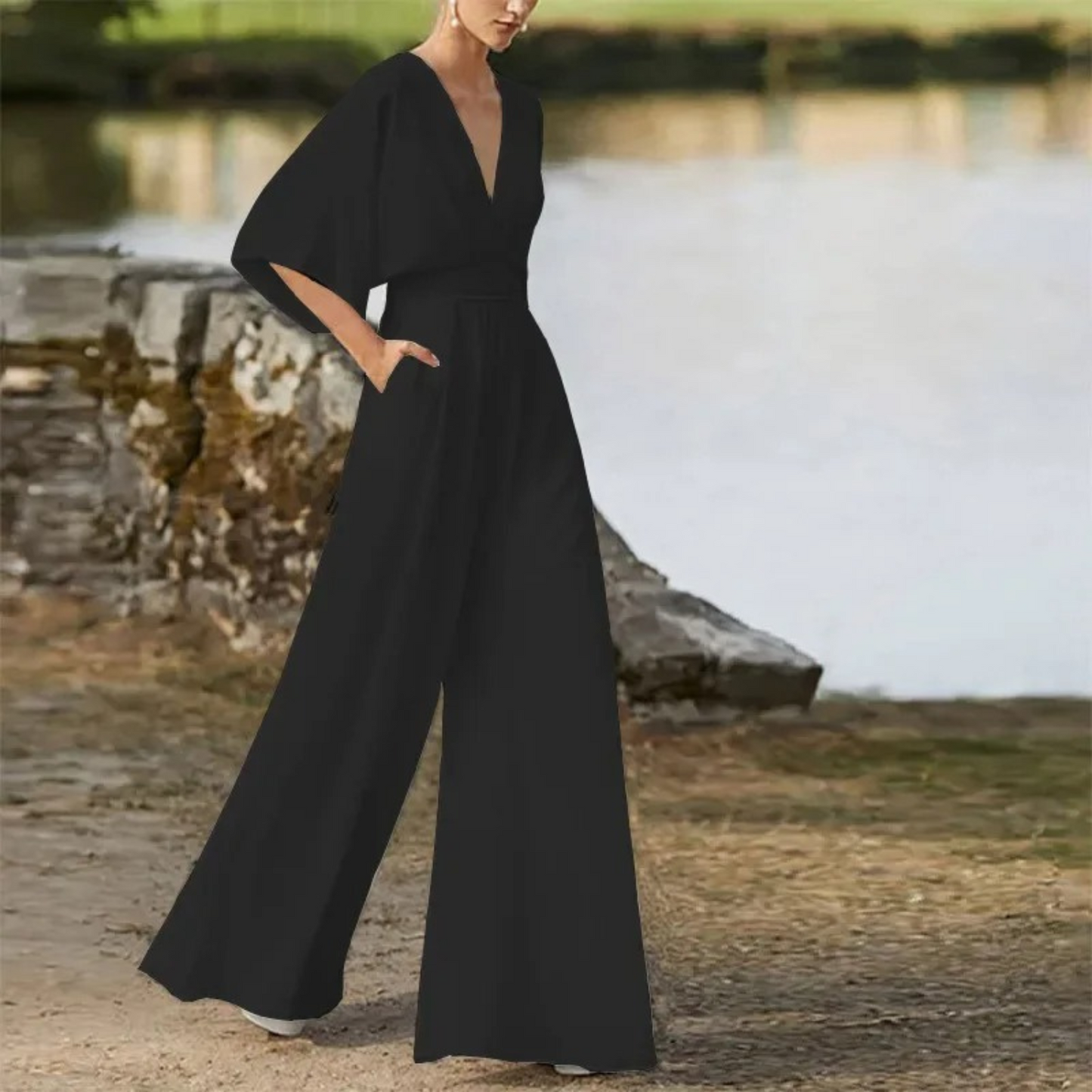 Genevieve - Elegant rødbrun jumpsuit med V-hals og løse bukser