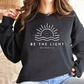 Hena - Elegant "Be The Light" sweatshirt